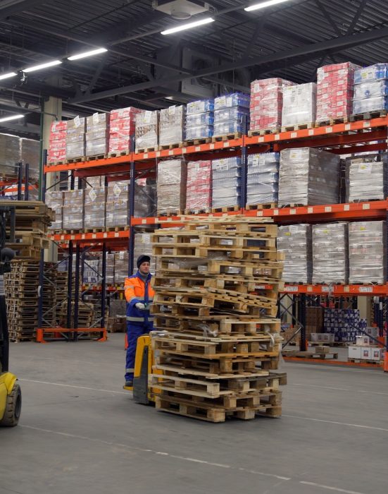A huge warehouse.Creative.A large storage of orders, which are carried by special boxes and moved by